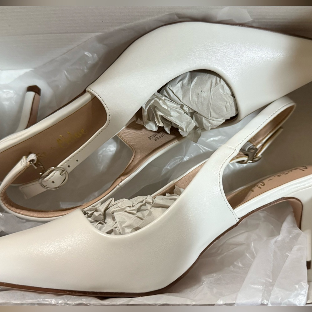 White sling back heels.